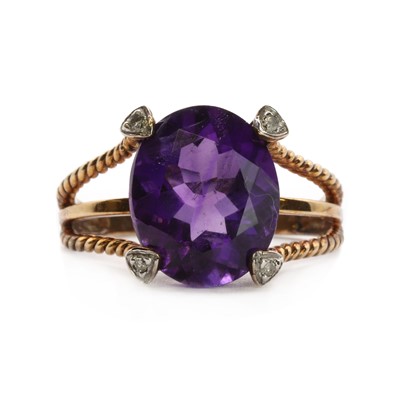 Lot 214 - A 9ct gold amethyst and diamond ring
