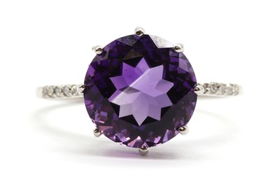 Lot 209 - A 9ct white gold amethyst and diamond ring