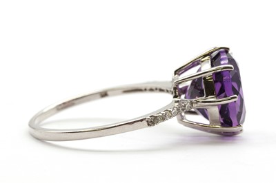 Lot 209 - A 9ct white gold amethyst and diamond ring