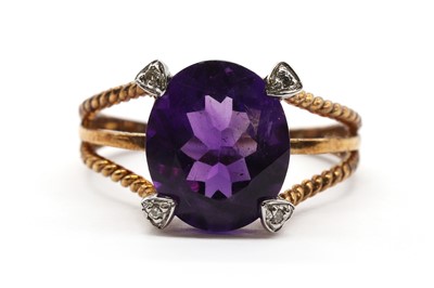 Lot 186 - A 9ct gold amethyst and diamond ring