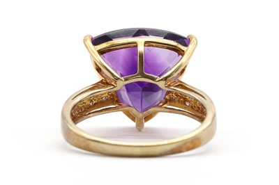 Lot 210 - A 9ct gold amethyst and diamond ring