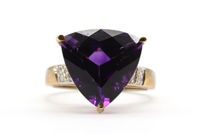 Lot 210 - A 9ct gold amethyst and diamond ring