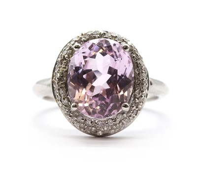 Lot 106 - A 9ct white gold kunzite and diamond cluster ring