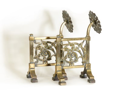 Lot 10 - A pair of cast brass andirons