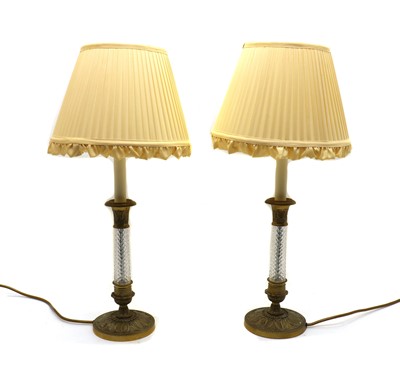 Lot 159 - A pair of Empire style gilt brass mounted candlestick lamps