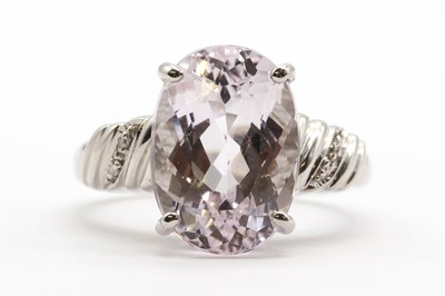 Lot 144 - A 9ct white gold kunzite and diamond ring