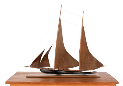 Lot 604 - A painted and teak centrepiece of a sailing boat