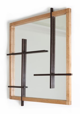 Lot 603 - A contemporary maple and coromandel wood mirror