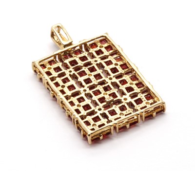 Lot 93 - A 9ct gold ruby and diamond pendant