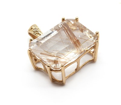 Lot 116 - A 9ct gold rutilated quartz and diamond pendant