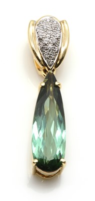 Lot 330 - An 18ct gold green tourmaline and diamond pendant