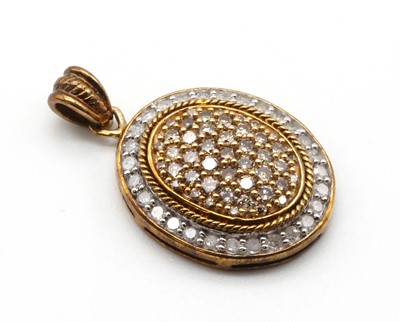 Lot 106 - A 9ct gold diamond pendant