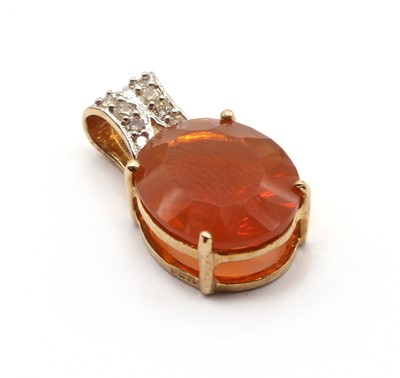 Lot 121 - A 9ct gold fire opal and diamond pendant