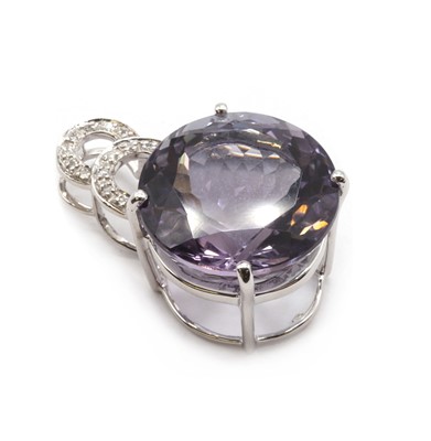 Lot 300 - A 9ct white gold amethyst and diamond pendant