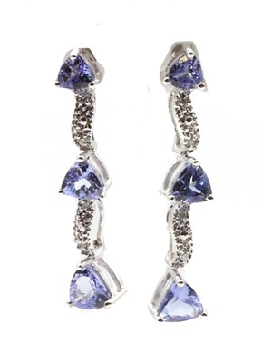 Lot 291 - A pair of 18ct white gold tanzanite and diamond drop earrings