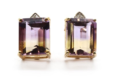Lot 307 - A pair of 9ct gold ametrine and diamond stud earrings