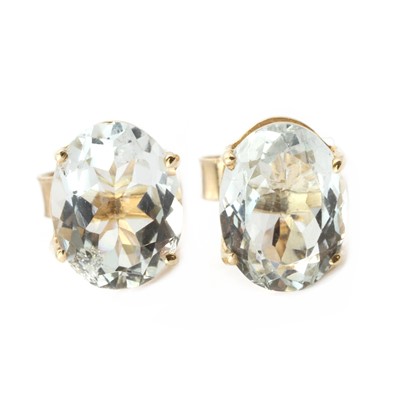 Lot 192 - A pair of gold aquamarine single stud earrings