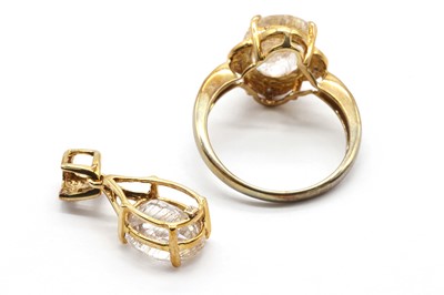 Lot 212 - A 9ct gold rutilated quartz and diamond ring
