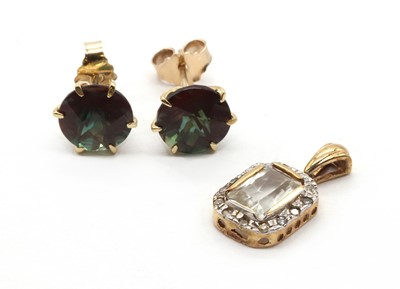 Lot 269 - A 9ct gold goshenite and diamond cluster pendant