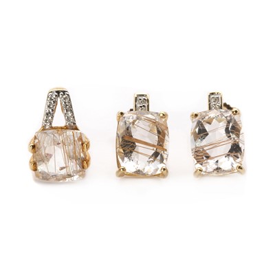 Lot 125 - A 9ct gold rutilated quartz and diamond pendant