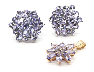 Lot 174 - A pair of 9ct white gold tanzanite cluster earrings