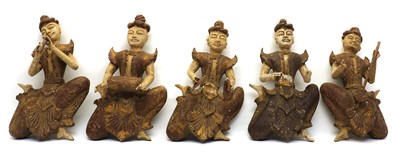 Lot 282 - A group of five carved Balinese figures