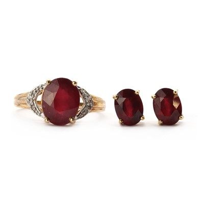 Lot 103 - A 9ct gold fracture filled ruby and diamond ring