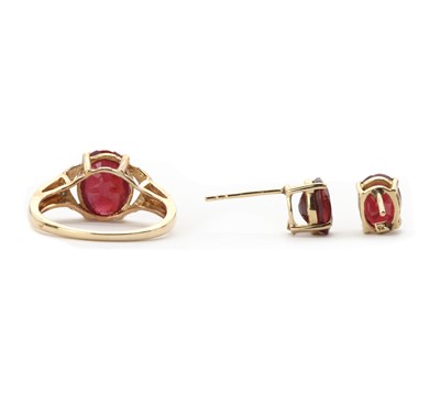 Lot 103 - A 9ct gold fracture filled ruby and diamond ring