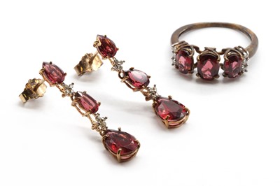 Lot 174 - A pair of 9ct gold rhodolite garnet and diamond drop earrings