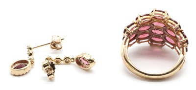 Lot 175 - A pair of gold rhodolite garnet and diamond drop earrings