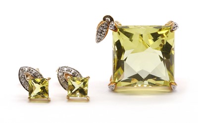 Lot 200 - A 9ct gold citrine and diamond pendant