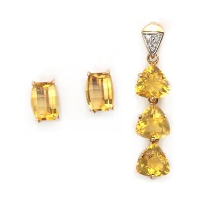 Lot 129 - A 9ct gold citrine and diamond pendant