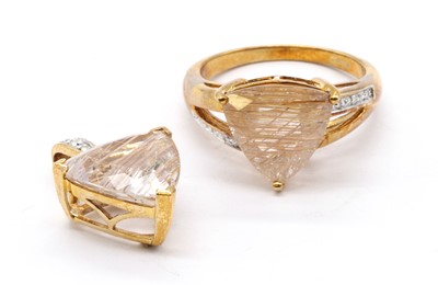 Lot 118 - A 9ct gold rutilated quartz and diamond ring