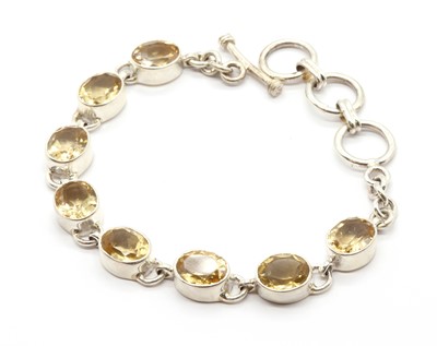 Lot 128 - A sterling silver citrine bracelet