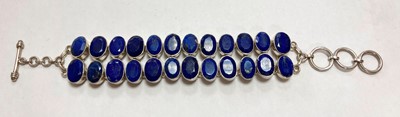 Lot 288 - A sterling silver lapis lazuli bracelet