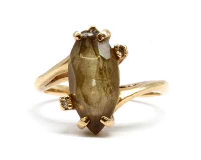 Lot 144 - A gold smoky quartz and diamond ring