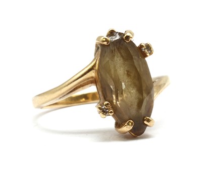 Lot 144 - A gold smoky quartz and diamond ring