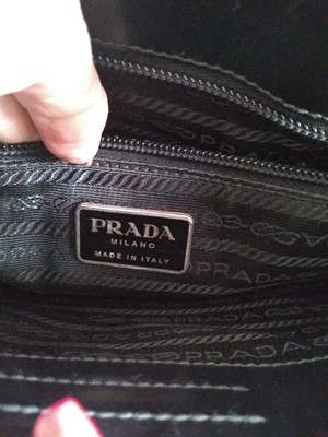 Lot 364 - A Prada black leather and grey canvas bag