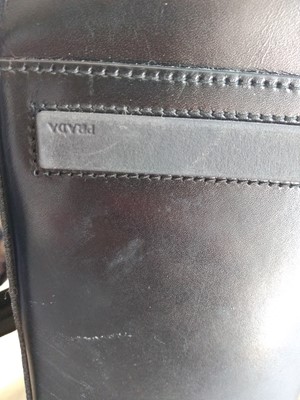 Lot 364 - A Prada black leather and grey canvas bag