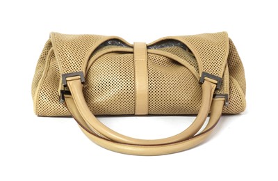 Lot 361 - A vintage Gucci tan perforated leather Jackie bag