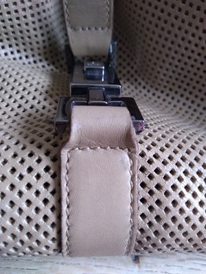 Lot 361 - A vintage Gucci tan perforated leather Jackie bag