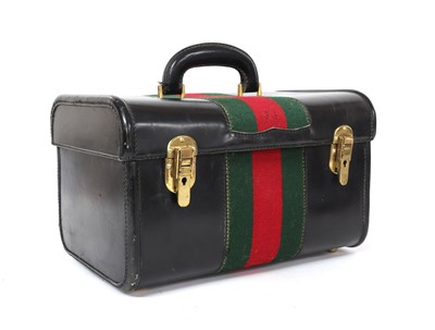 Lot 392 - A vintage Gucci black leather vanity case