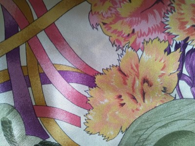 Lot 335 - A Chanel silk scarf, and three others