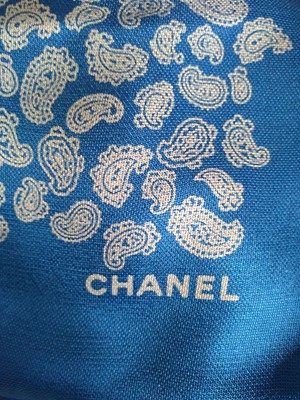 Lot 335 - A Chanel silk scarf, and three others