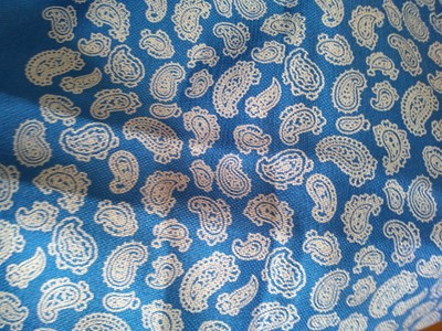 Lot 335 - A Chanel silk scarf, and three others