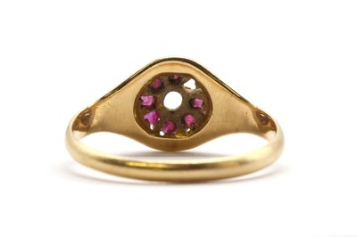 Lot 34 - A gold ruby cluster ring