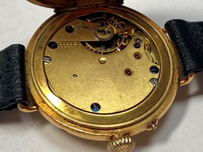 Lot 355 - An 18ct gold pin set mechanical strap watch
