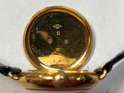 Lot 355 - An 18ct gold pin set mechanical strap watch