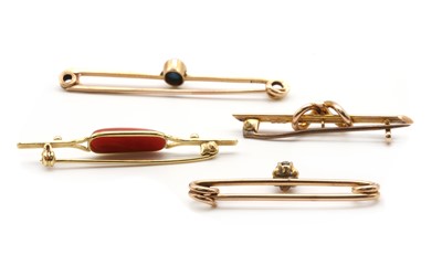 Lot 26 - Four gold brooches