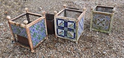 Lot 316 - A group of three iron planters